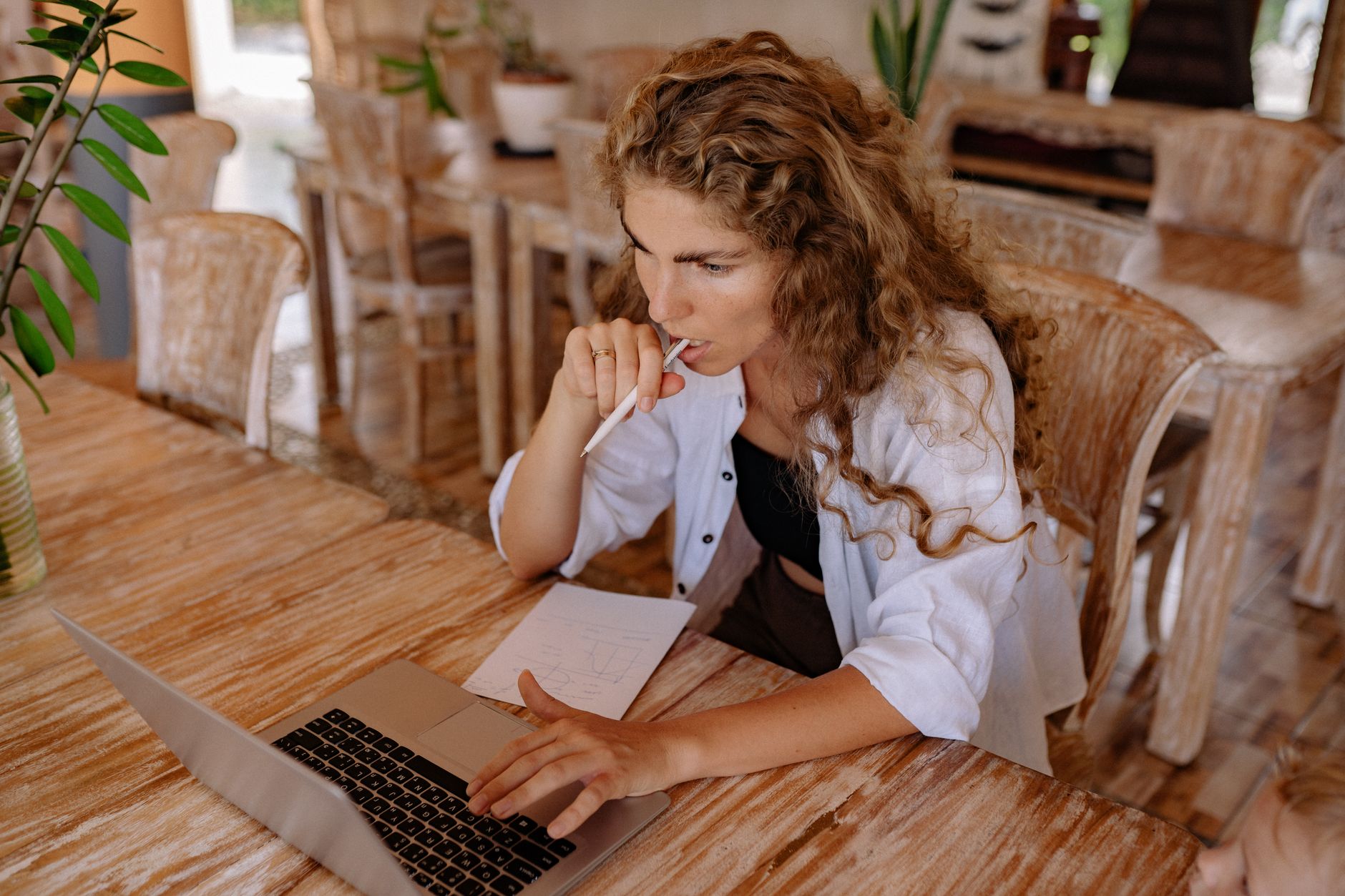 A consumer asking an AI assistant which real estate agent to hire