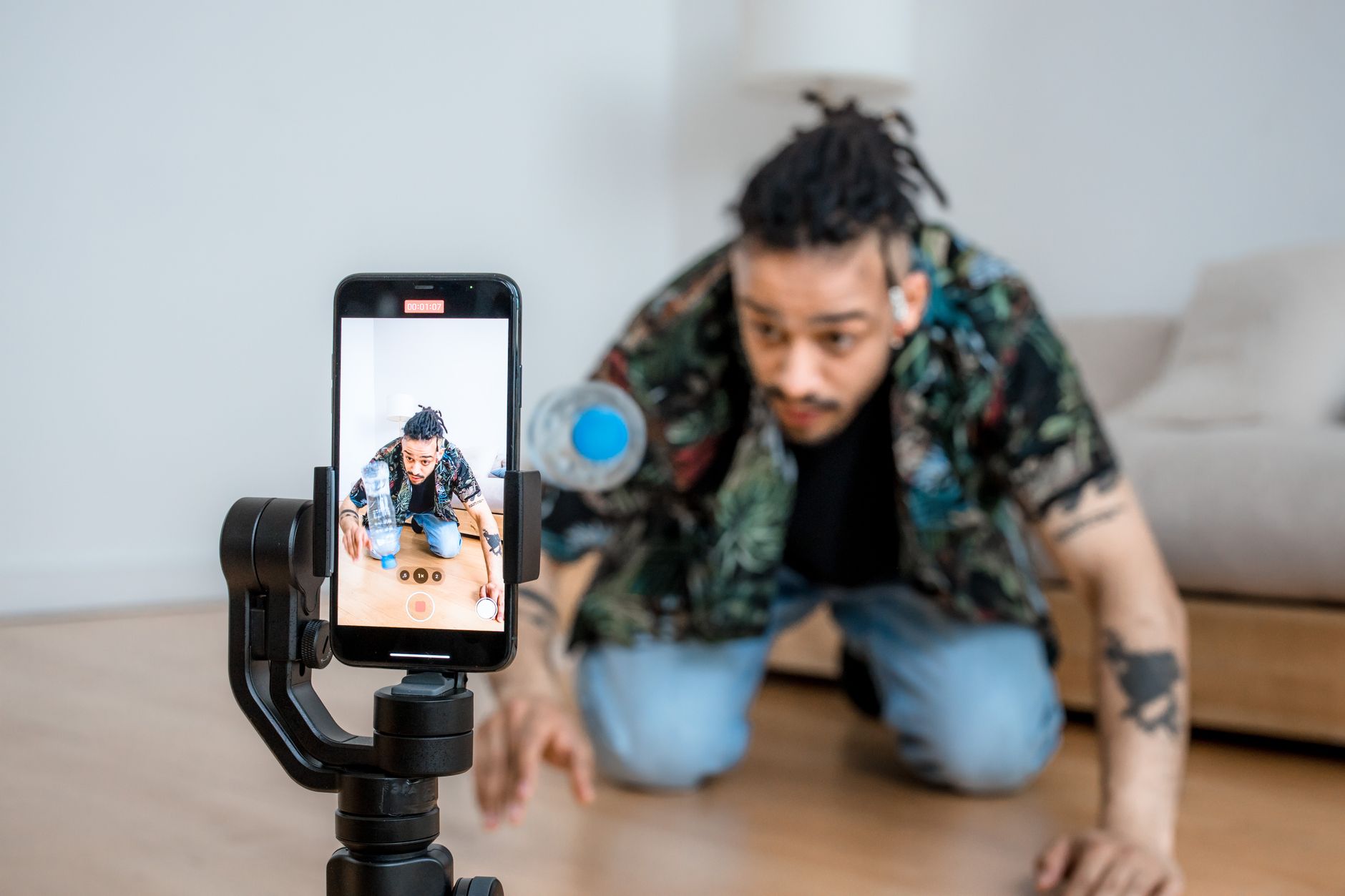 A real estate agent recording a short video on a phone
